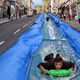Illustration for article titled Help A Man Build A 300-Foot Water Slide In The Middle Of A Road